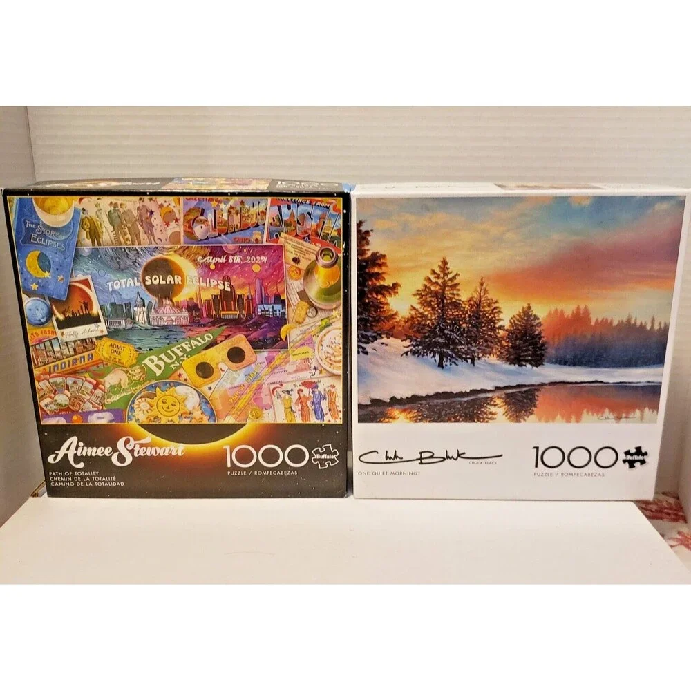 Lot 2 Puzzles 1000 piece each w/ Posters Path of Totality, One Quiet Morning